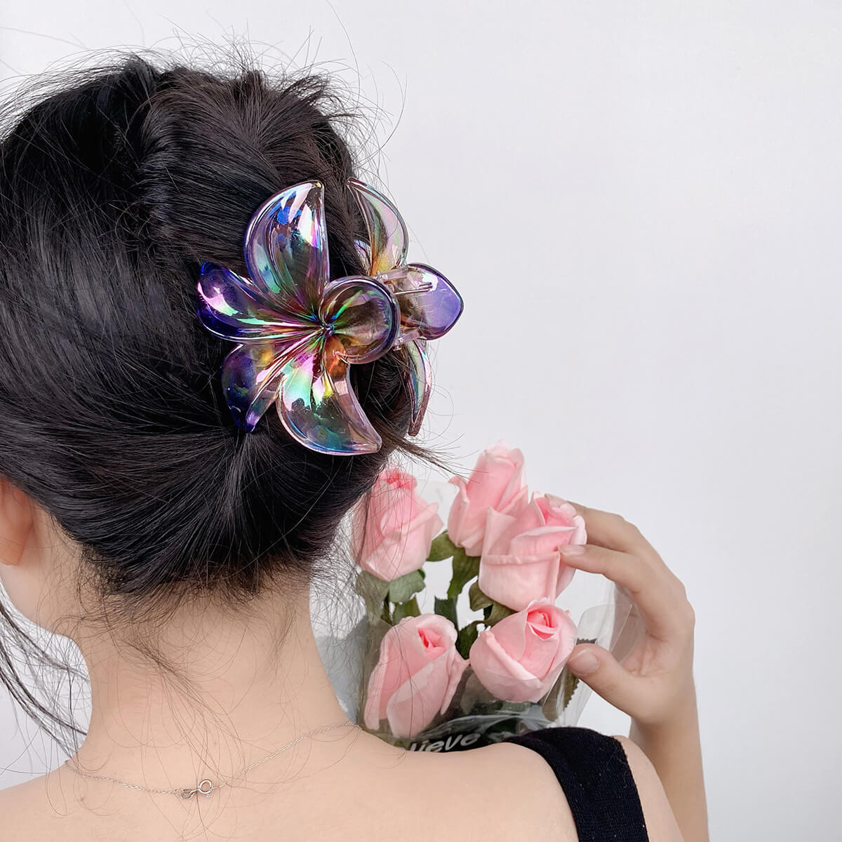 Hawaiian Style Laser Colored Plumeria Flower Shaped Hair Claw Clip - model wearing