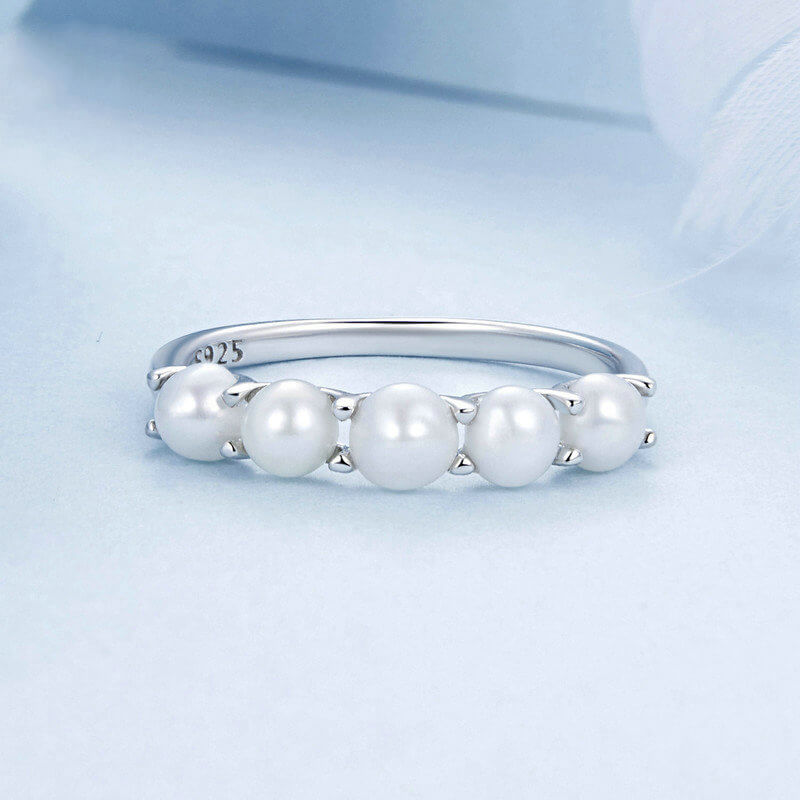 Elegant Pearl Half Eternity Ring in Sterling Silver front