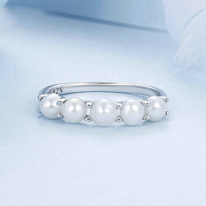 Elegant Pearl Half Eternity Ring in Sterling Silver front