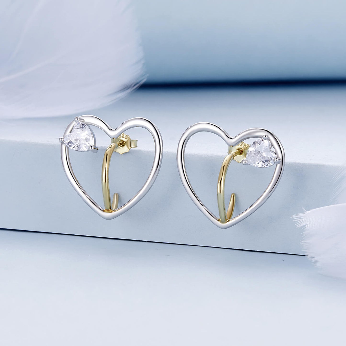 Hollow Heart Zircon Earrings in Sterling Silver front