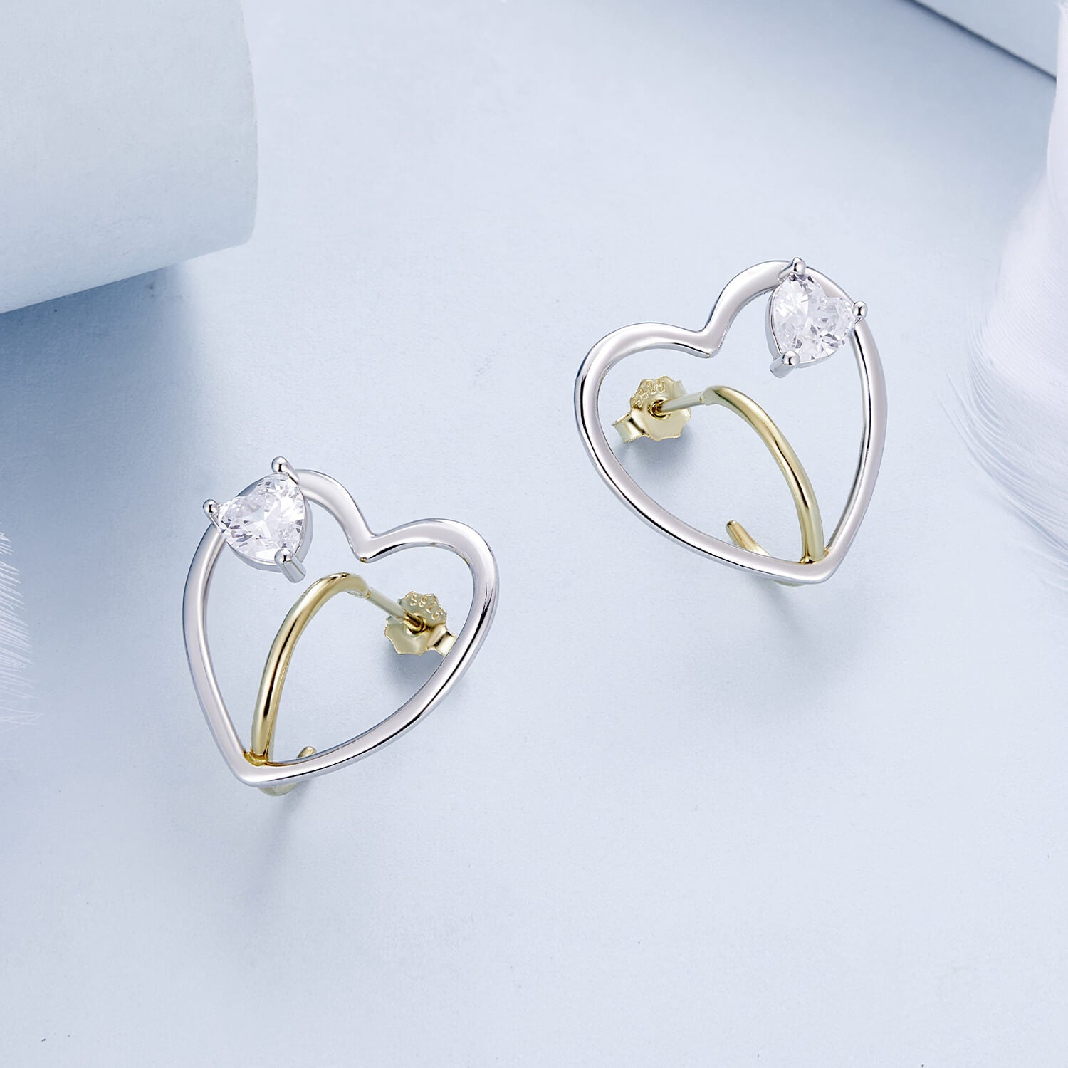 Hollow Heart Zircon Earrings in Sterling Silver front