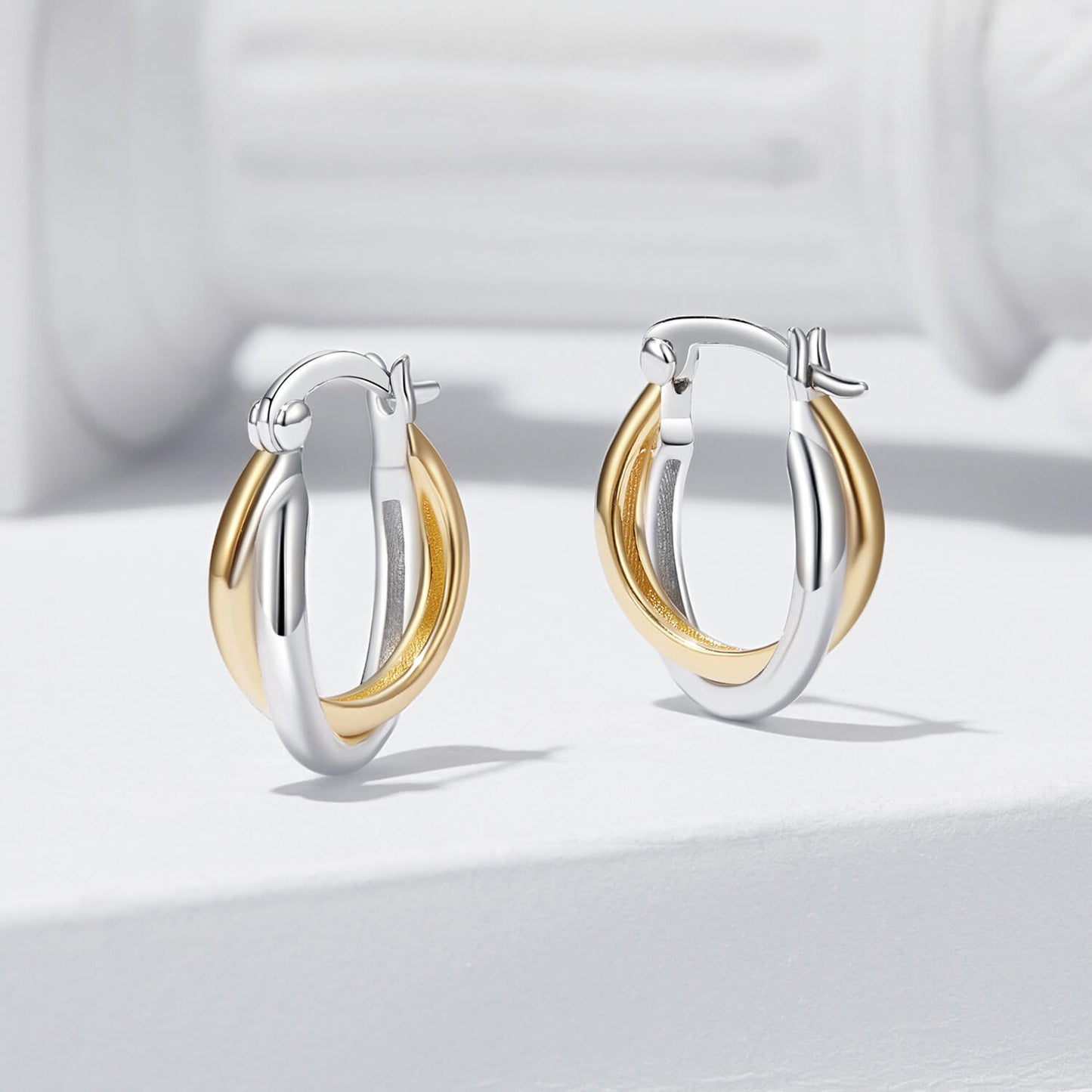 Minimalist Two-tone Twisted Huggie Earrings Set in Sterling Silver hoop sides