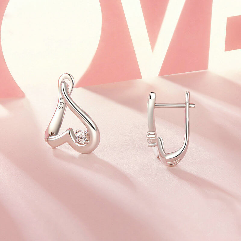 Elegant Streamlined Heart Zircon Huggie Earrings front and side