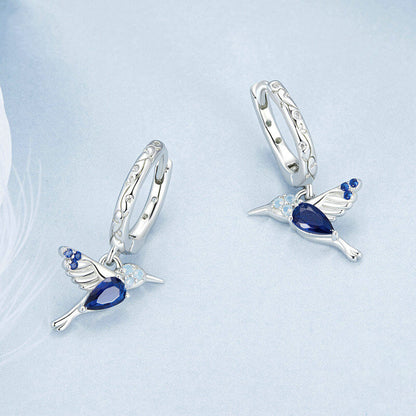 Elegant Blue Hummingbird Huggie Earrings in Sterling Silver - front