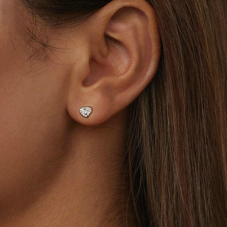 Heart-cut Moissanite Stud Earrings in Silver with ball back - model wearing