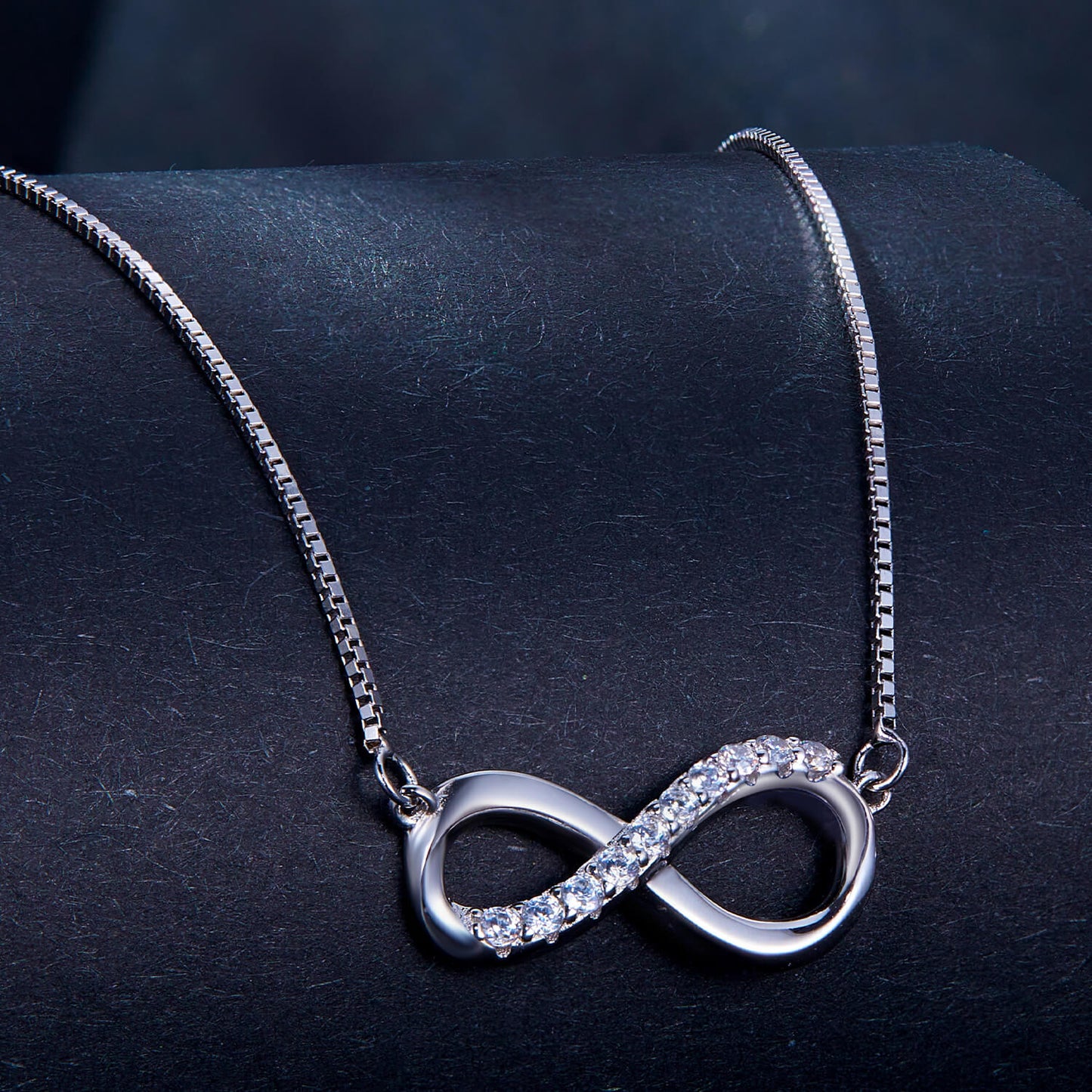 Infinity Mobius Strip Moissanite Necklace in Sterling Silver side