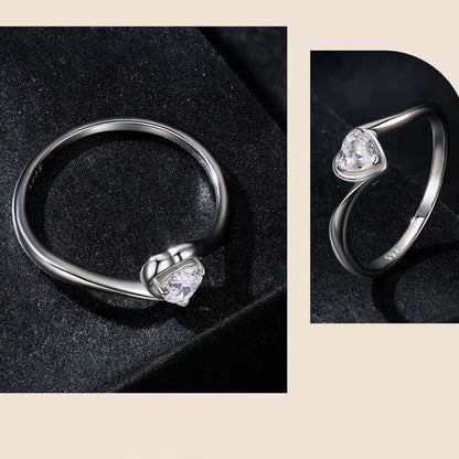 Twisted Arm Bezel Setting Heart Moissanite Ring in Sterling Silver sides