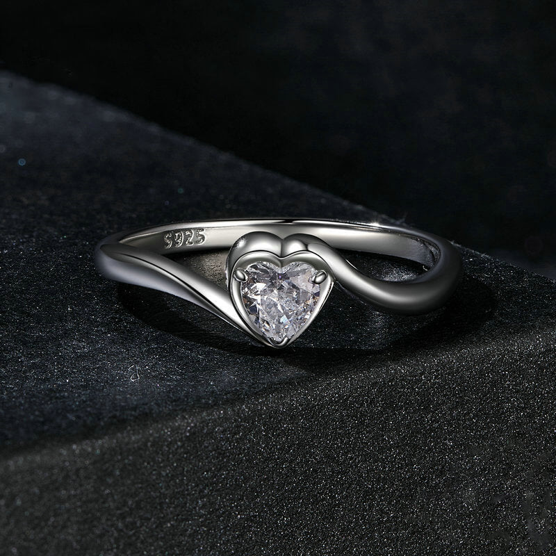 Twisted Arm Bezel Setting Heart Moissanite Ring in Sterling Silver front