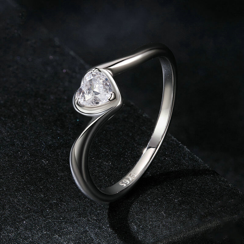 Twisted Arm Bezel Setting Heart Moissanite Ring in Sterling Silver side