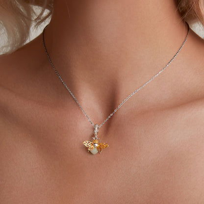 Glow-in-the-night Golden Bee Zircon Charm in Sterling Silver necklace model