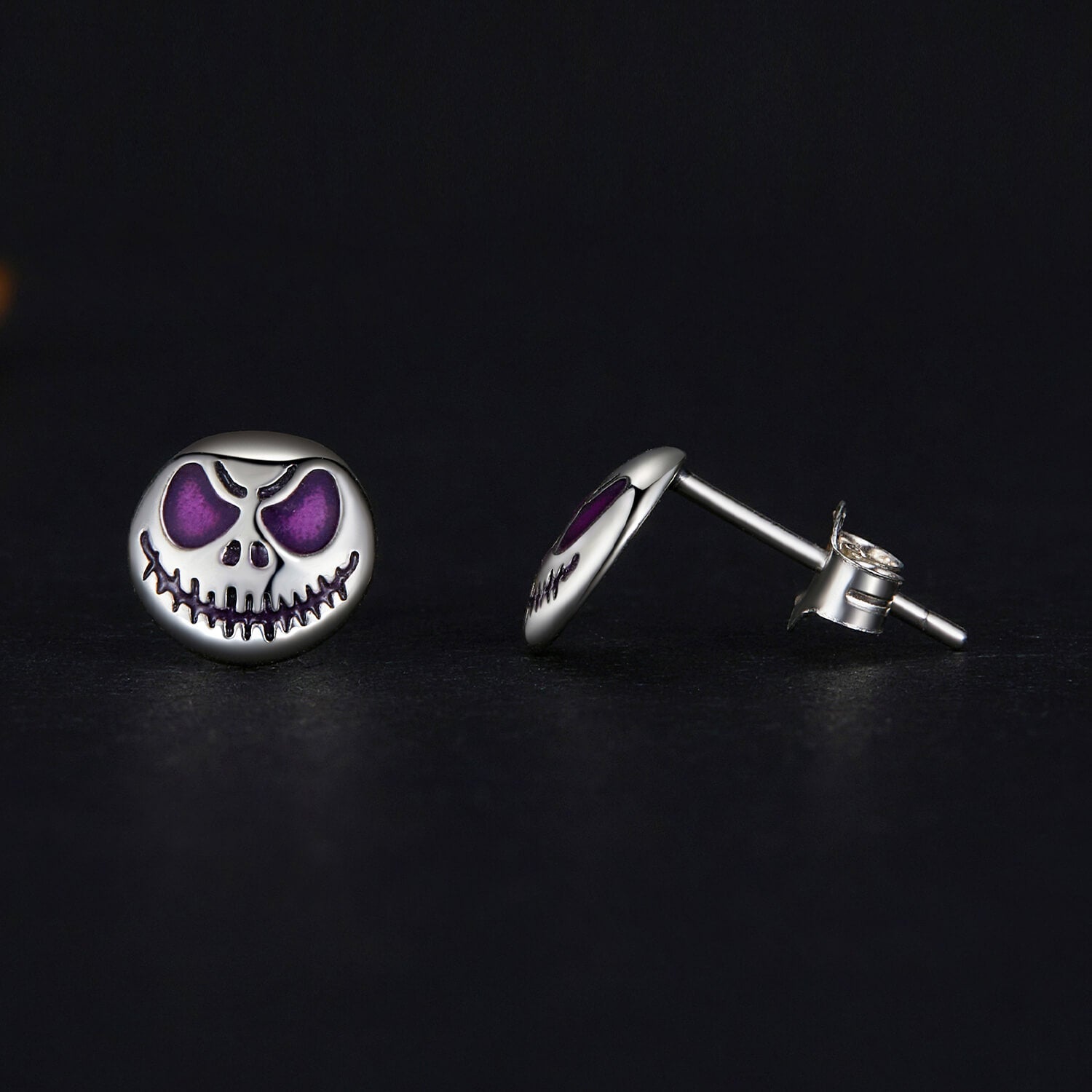 Glow-in-the-dark Skull Enamel Earrings in Sterling Silver front and side