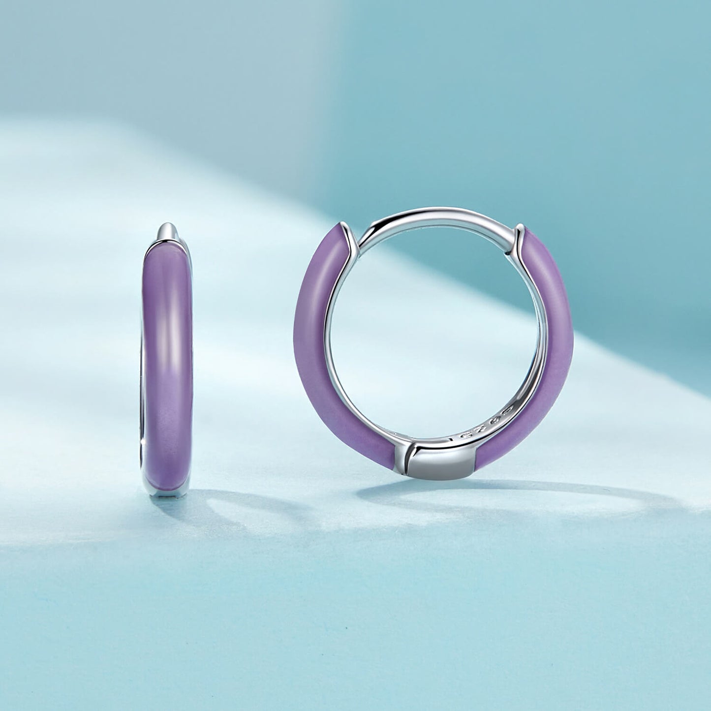 Glow-in-the-dark Purple Enamel Hoop Earrings in Sterling Silver front and side