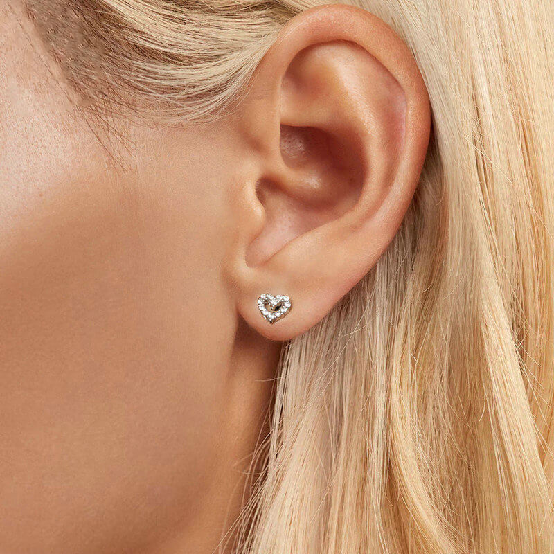 Mini Heart Zircon Stud Earrings in Silver with Ball Back - model wearing