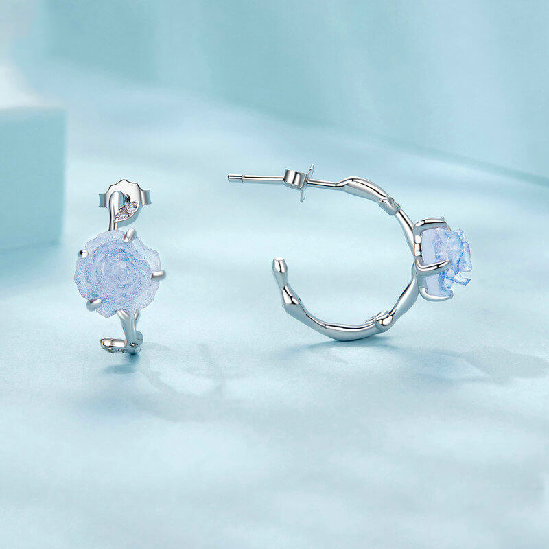 Sunshine Color-changing Magic Blue Rose Huggie Earrings in Silver - front & side