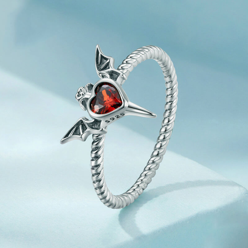 Devil Bat Wing Red Heart Zircon Ring in Sterling Silver stand