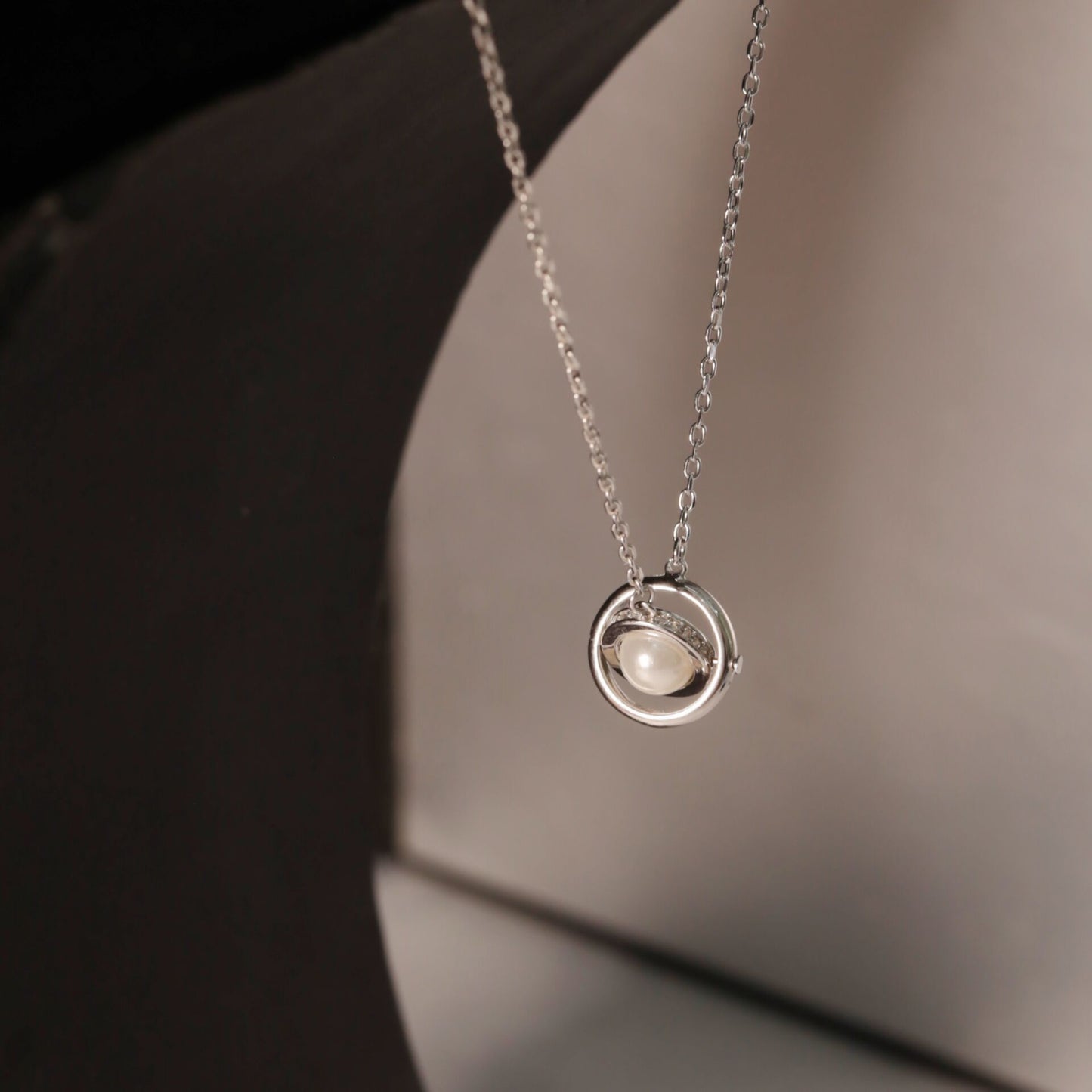 Planet Rotating Pearl Zircon Necklace in Sterling Silver