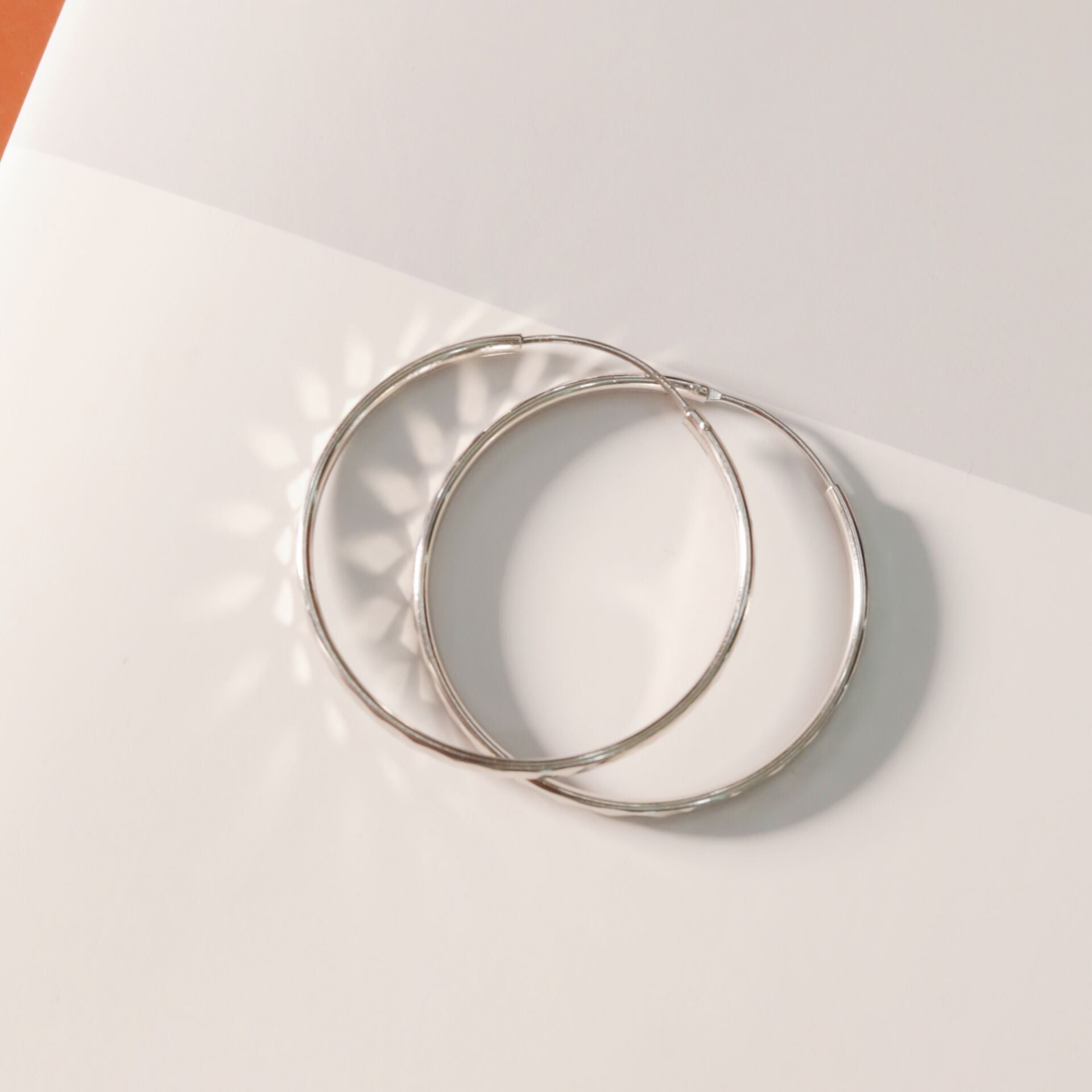 Rhombus Pattern Hoop Earrings in Sterling Silver side