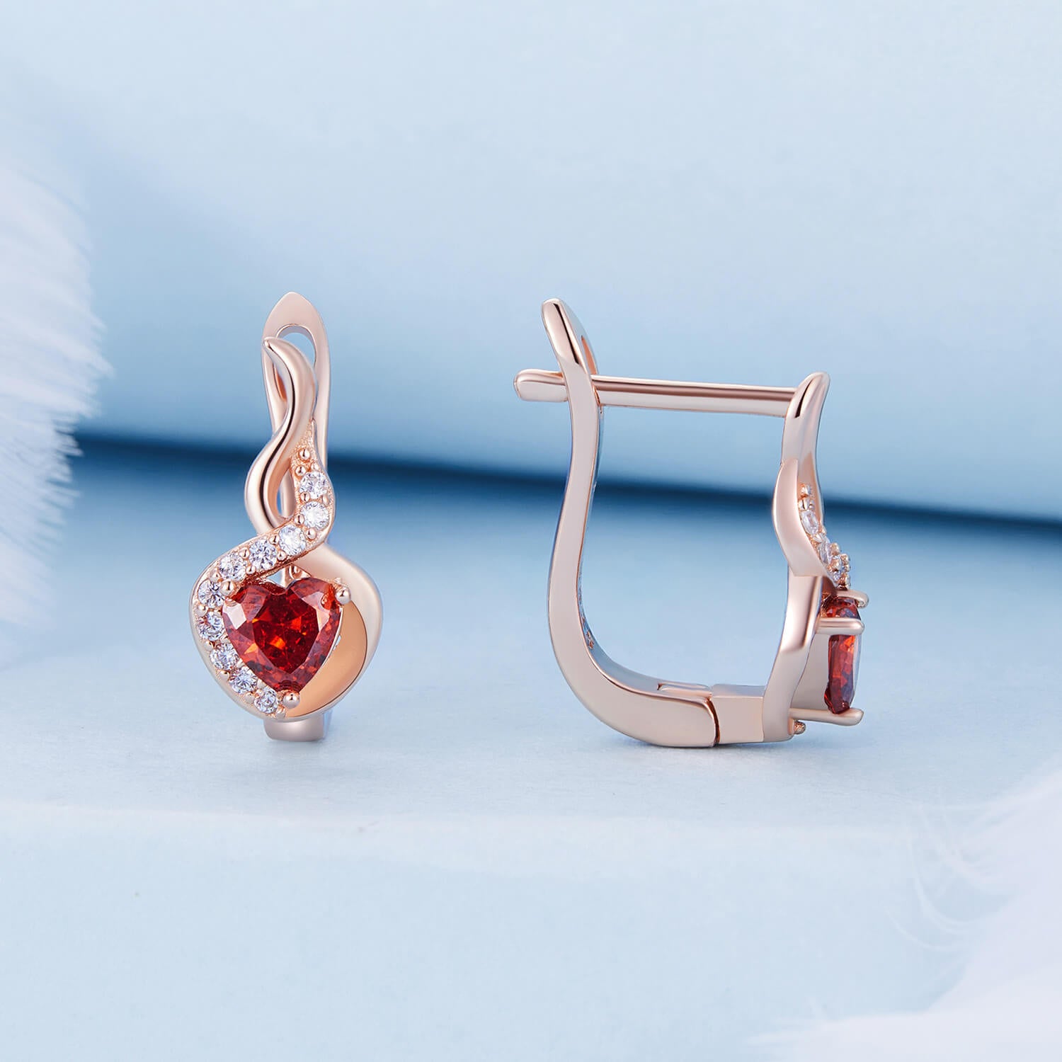 Music of Love Zircon Huggie Earrings in Sterling Silver front and side