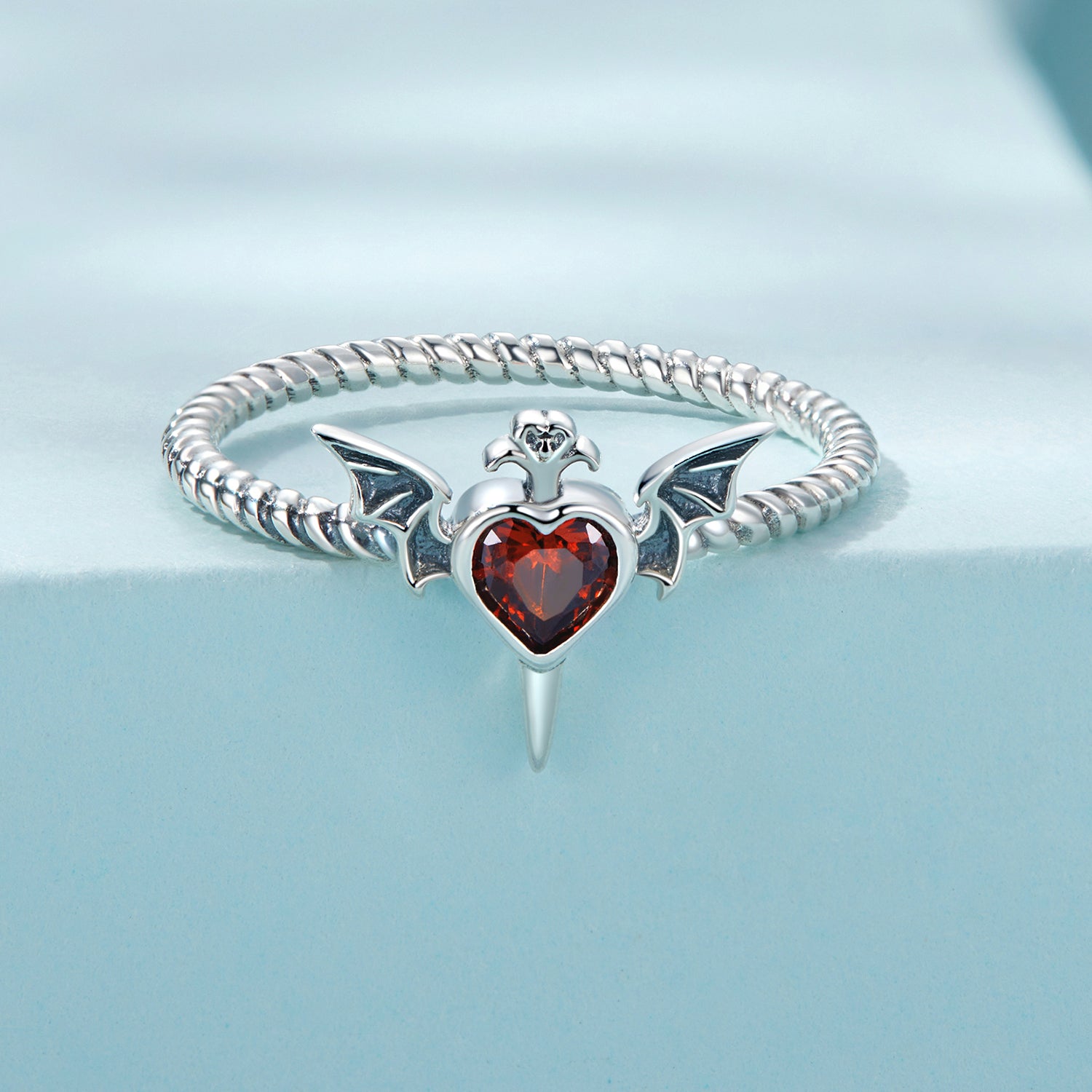 Devil Bat Wing Red Heart Zircon Ring in Sterling Silver front